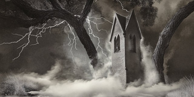 Violent Storm with Lightning Striking Large Tree