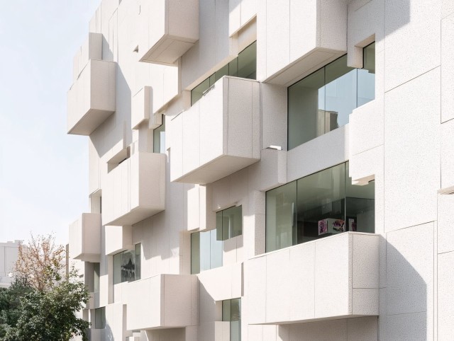 Tropical Apartment Building with Travertine Marble Facade